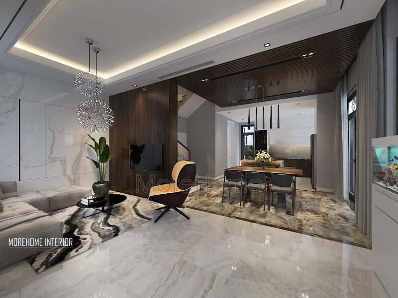 Điểm nhấn ấn tượng giữa gỗ ốp tường cùng đá lát sàn cao cấp tạo nên ánh nhìn hiện đại, cuốn hút cho phòng khách liền bếp ăn. thiết kế biệt thự