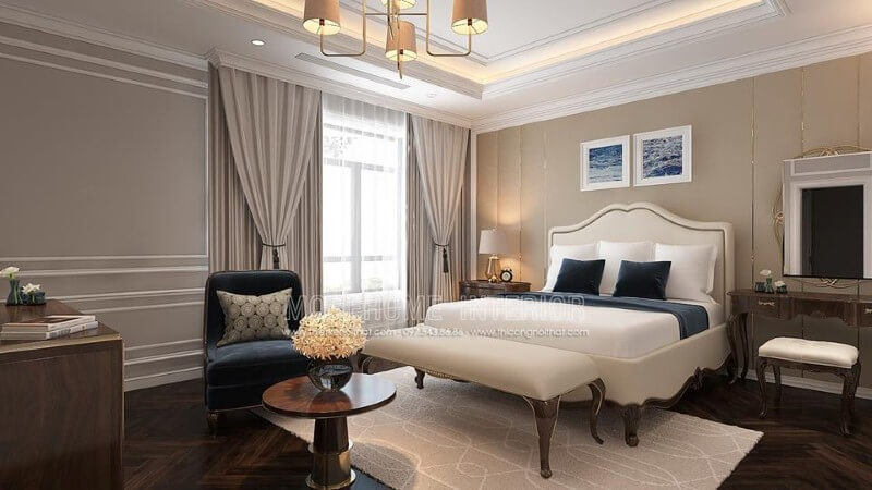 Giường ngủ tân cổ điển thanh lịch, quý phái với sắc trắng tinh khôi hòa quyện với đường nét mềm mại từ gỗ óc chó cao cấp tạo nên điểm nhấn ấn tượng cho phòng ngủ master. thiết kế biệt thự